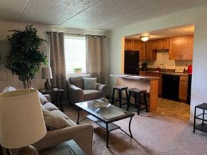 Pittsburgh apartment for rent - Living Room With Kitchen at North Pointe Commons Apts, Pittsburgh, PA 15229