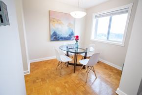 Winnipeg apartment for rent - Elegant Dining Space at 1310 Archibald Apartments, Winnipeg, MB R2J 0Z4