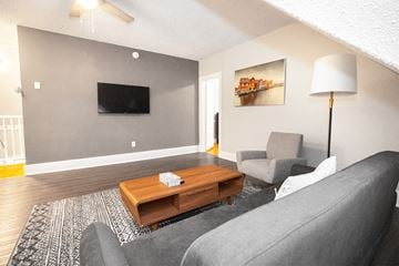 Winnipeg apartment for rent - a living room with a couch and a coffee table