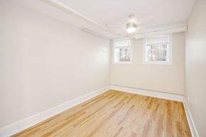 Winnipeg apartment for rent - Living area at 980 Wolseley Apartment Suites
