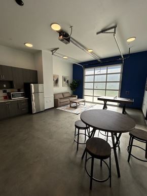 San Ysidro apartment for rent - A kitchen with a table and chairs in the middle of the room.