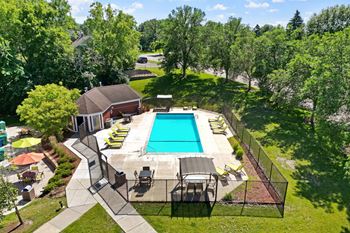 Outdoor heated swimming pool with sundeck