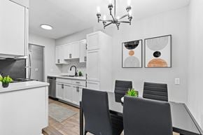 Plymouth apartment for rent - a kitchen and dining room with a table and chairs