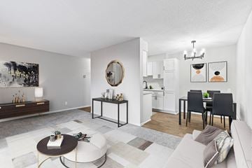 Plymouth apartment for rent - a living room with a couch and a table