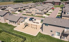 Sioux Falls townhouse for rent - A residential area with houses and a playground.