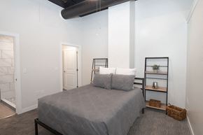 Sioux Falls apartment for rent - a bedroom with a bed and a closet