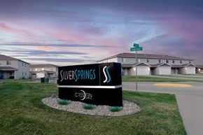Sioux Falls townhouse for rent - A sign for Silver Springs with a Cresten logo on it.
