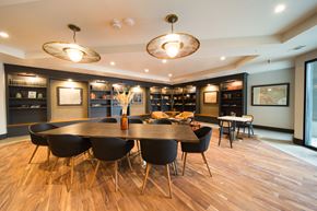 San Antonio apartment for rent - A modern dining room with a large table and chairs.