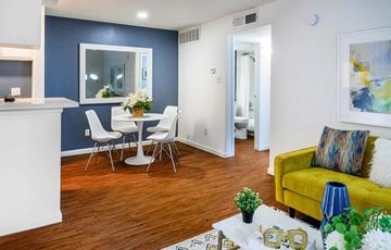 Houston apartment for rent - a living room with a couch and a table