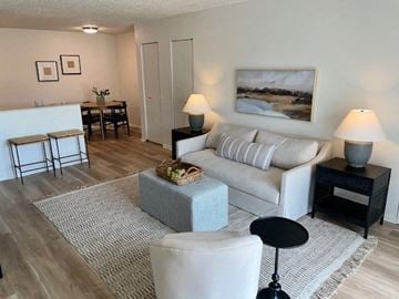 St. Peters apartment for rent - a living room with a couch and a table