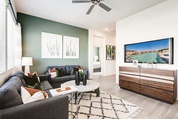 Surprise apartment for rent - a living room with a couch and a tv