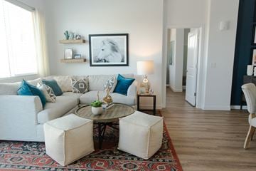El Mirage apartment for rent - a living room with a white couch and a coffee table