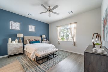 Thornton apartment for rent - a bedroom with a bed and a ceiling fan