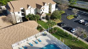 Oviedo apartment for rent - an aerial view of a house with a pool in front of it at Tivoli Apartments of Orlando, Oviedo, 32765