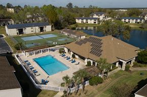 Gainesville townhouse for rent - an aerial view of the pool and tennis court at the resort at Stoneridge Apartments, Florida, 32608