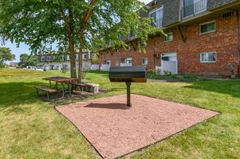 Community grill and picnic area with green space
