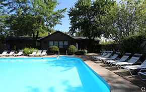 Cincinnati apartment for rent - a swimming pool in front of a house