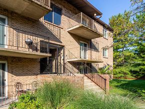 Batavia apartment for rent - a brick apartment building with two balconies