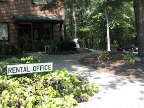 Cincinnati apartment for rent - a rental office sign in front of a house