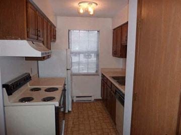 Loveland apartment for rent - a kitchen with a stove and a refrigerator