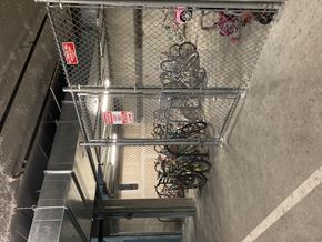 San Jose apartment for rent - A metal rack with a red sign on it.