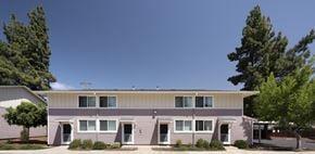 Campbell apartment for rent - A two-story building with a flat roof and a garage door.