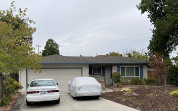 San Jose apartment for rent - A house with a car parked in front of it.