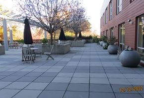 Sunnyvale apartment for rent - A patio with a table and chairs and umbrellas.