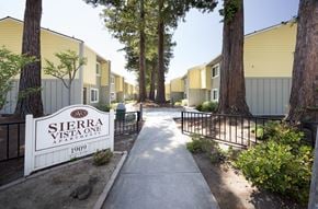 Mountain View apartment for rent - A Sierra Vista One Apartments sign is in front of a building.
