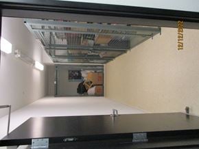 Sunnyvale apartment for rent - A room with a white floor and a black table with a metal frame.
