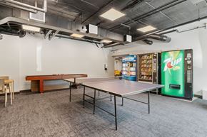 Minneapolis apartment for rent - a room with a ping pong table and a pool table