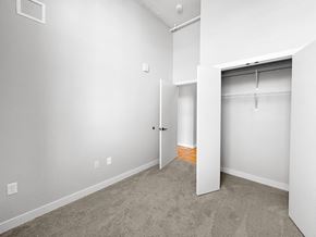 International Falls apartment for rent - an empty bedroom with a closet and a door to the bathroom