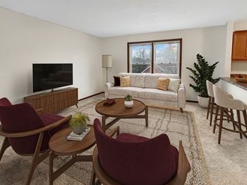 St. Paul townhouse for rent - a living room with a couch and a table and chairs