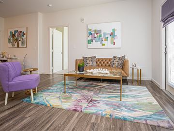 Zachary apartment for rent - a living room with a couch and a coffee table