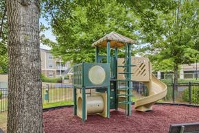 Macon apartment for rent - a playground with a jungle gym and a slide