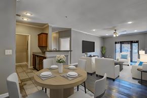North Little Rock apartment for rent - A modern dining room with a round table set for four.