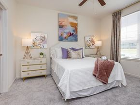 Zachary apartment for rent - a bedroom with a bed and a dresser