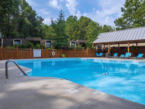Meridian apartment for rent - a swimming pool with chairs and a resort style pool