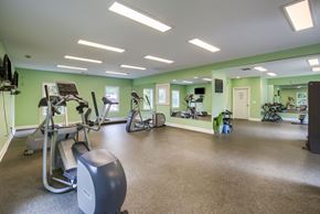 Columbus apartment for rent - a large fitness room with treadmills and other exercise equipment