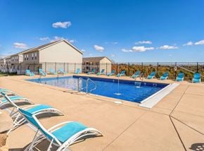 Triadelphia apartment for rent - our apartments have a large pool and lounge chairs