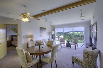 Morgantown apartment for rent - a living room and dining room with a table and chairs