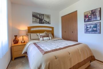 Morgantown apartment for rent - a bedroom with a bed and a closet