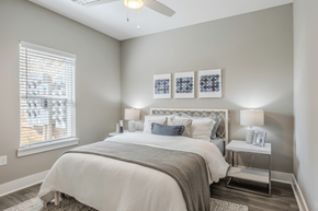 Macon apartment for rent - a bedroom with a bed and a ceiling fan