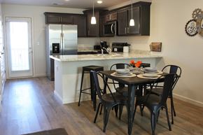 Lyman townhouse for rent - A kitchen with a table and chairs.