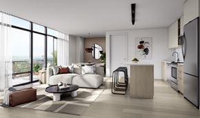 Ottawa apartment for rent - A modern living room with a large window overlooking the city.