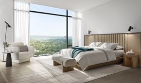 Ottawa apartment for rent - A modern bedroom with a large bed and a view of the city.
