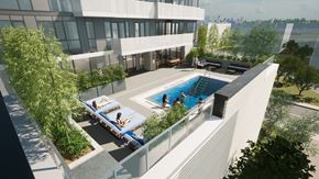 Ottawa apartment for rent - an aerial view of an apartment building with a pool and terraces