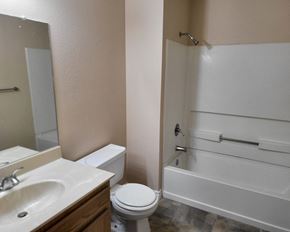 El Cajon apartment for rent - an empty bathroom with a toilet sink and shower