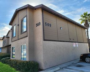 El Cajon apartment for rent - a building with a car parked in front of it