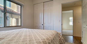 El Cajon apartment for rent - a bedroom with a bed and a window and a closet
